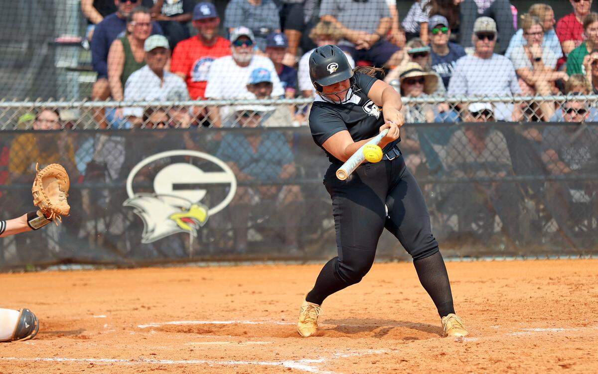 Gray Collegiate’s Kaley Anderson (13) connects for a two-run home run in the 2025 Class 4A softball state championship win on Saturday, May 31. The War Eagles defeated York 5-2.