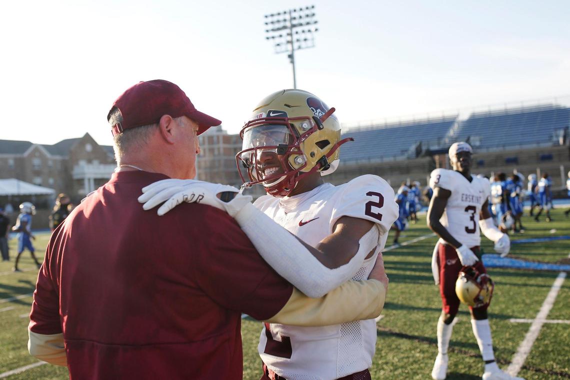 Erskine coach Shap Boyd and wide receiver Senika McKie (1) have a moment after the the win Saturday over the Barton Bulldogs.