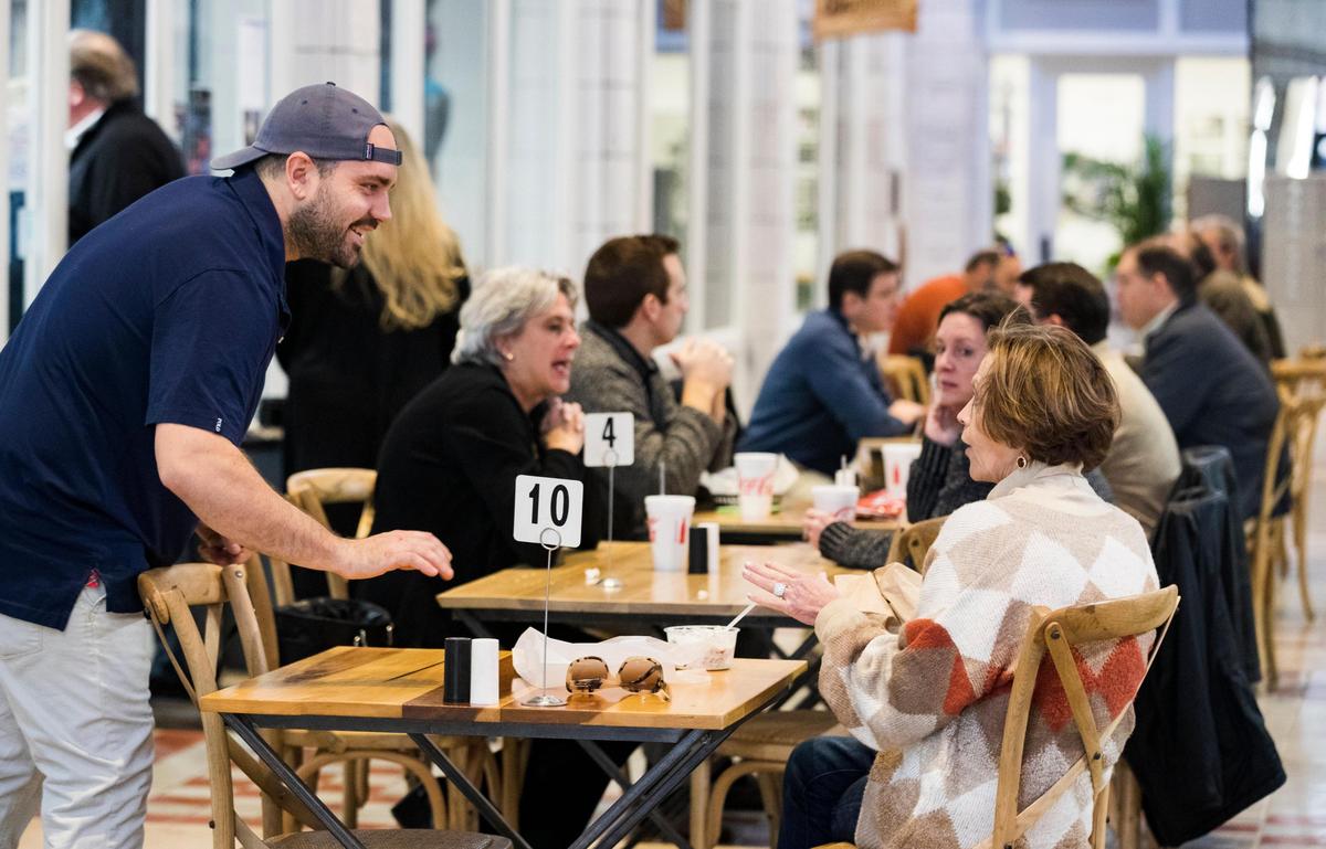 Customers eat lunch at Swanson’s Deli in the Arcade Mall in downtown Columbia, South Carolina on Wednesday, January 8, 2020.
