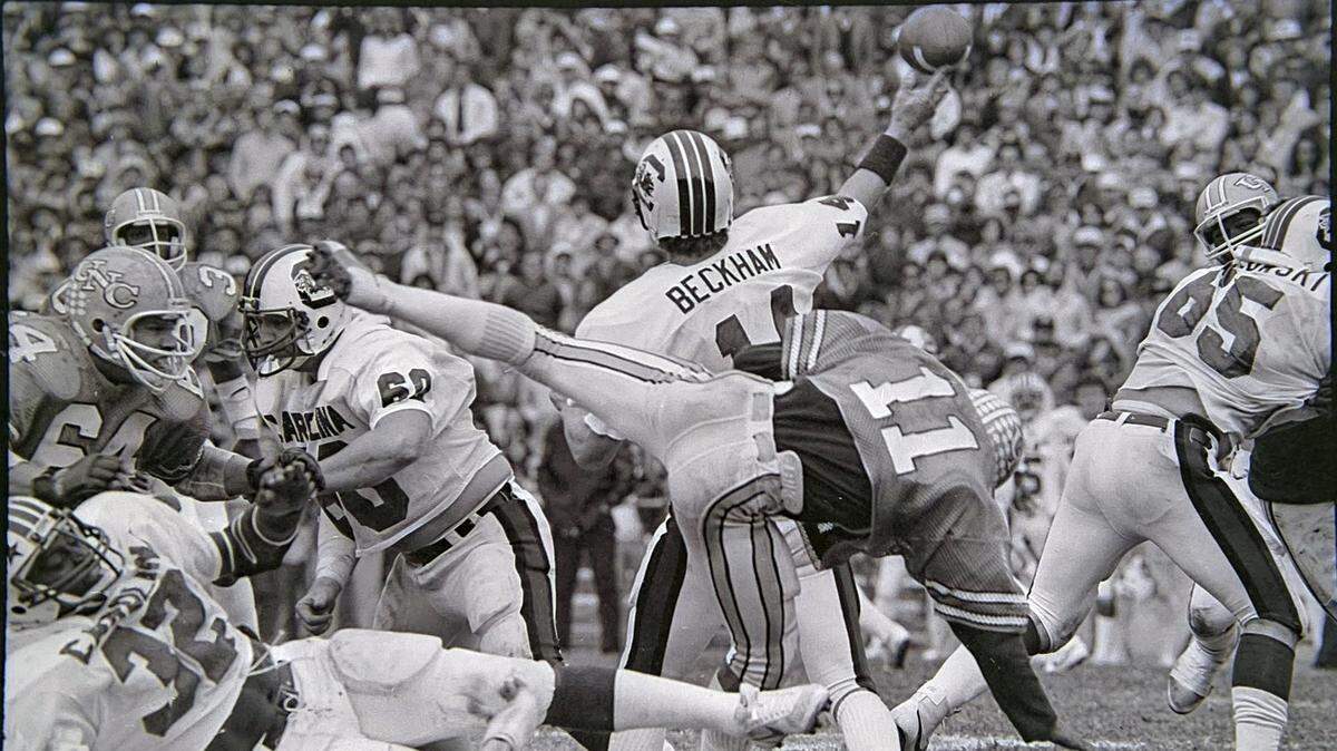 South Carolina quarterback Gordon Beckham throws the ball against the UNC Tar Heels during their Oct. 24, 1981 game in Chapel Hill.