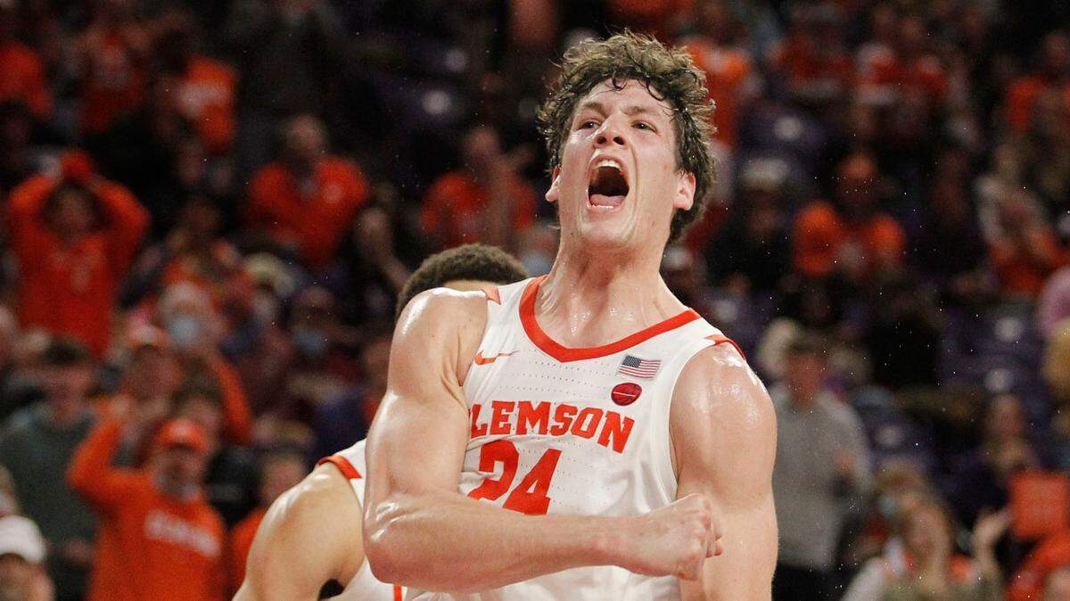 Clemson forward PJ Hall (24) celebrates after blocking a Florida State shot during late, second-half action in Clemson, S.C. on Wednesday, Feb. 2, 2022.
