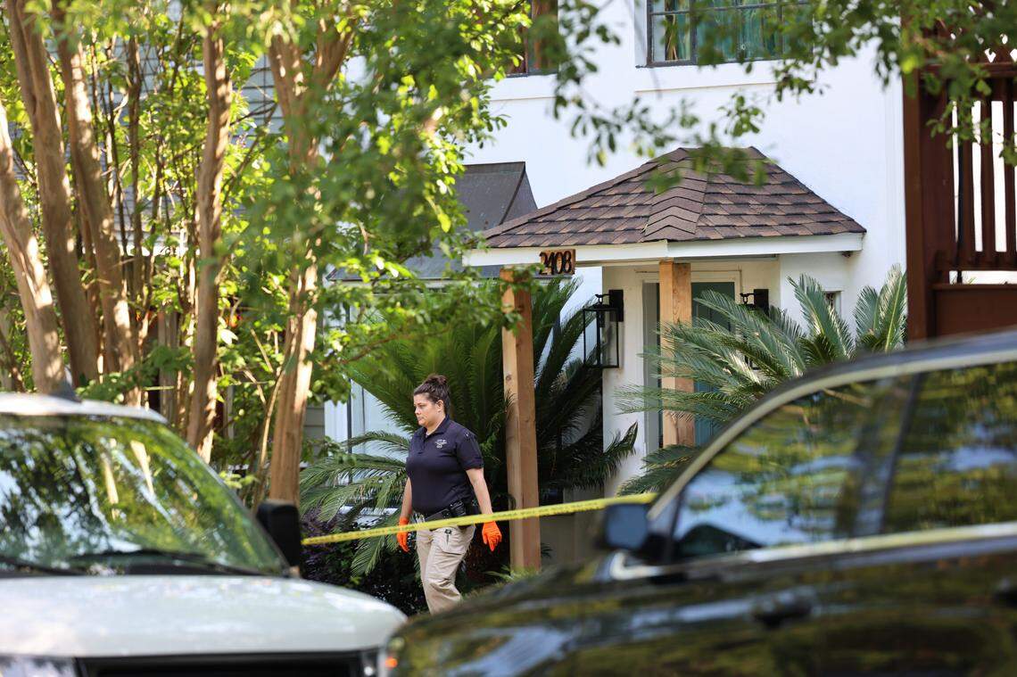 A law enforcement official leaves an Airbnb at 2408 Lincoln on Friday, June, 6, 2025. There was a shooting at the house earlier in the morning, leaving three people injured and one dead.