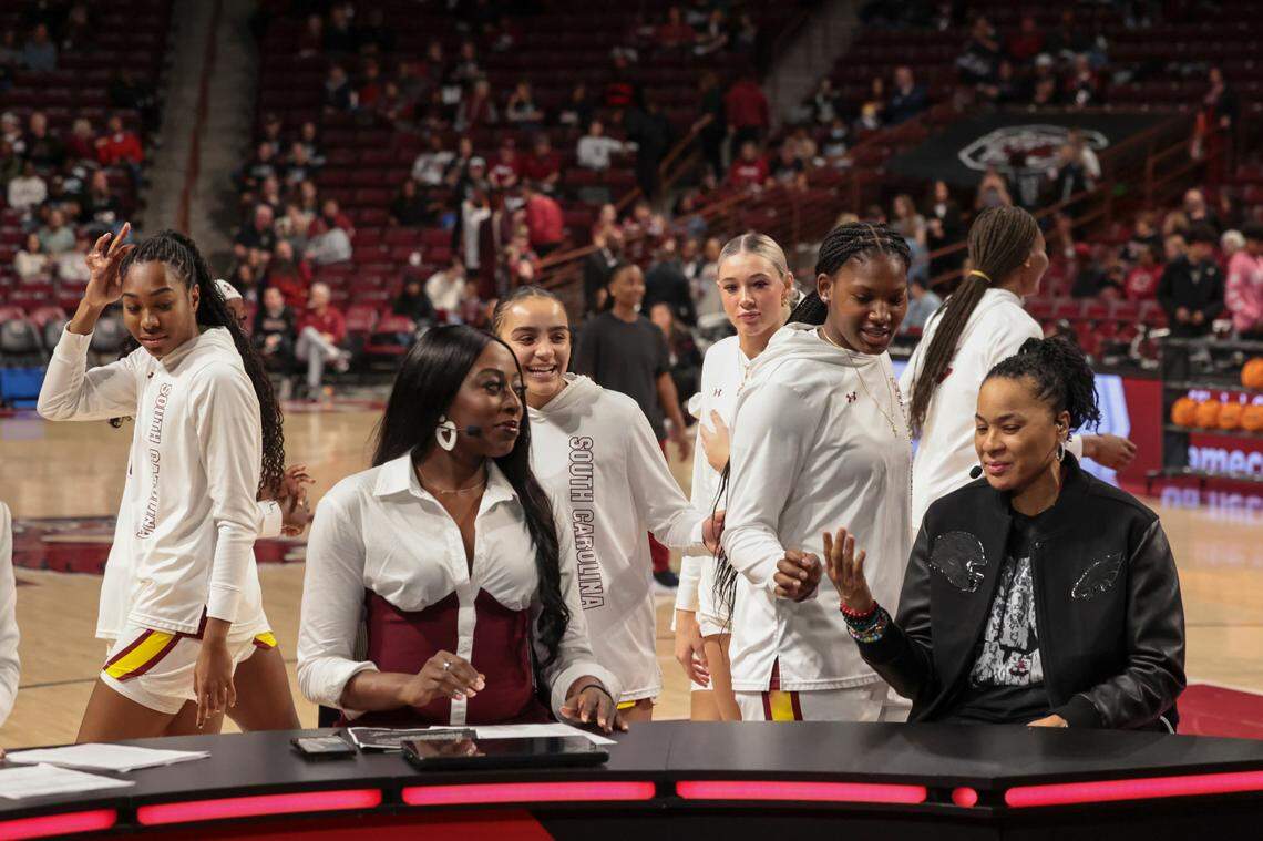 Gamecock players greet University of South Carolina head coach Dawn Staley as she speaks with Chiney Ogwumike on ESPN College GameDay at the Colonial Life Arena on Sunday, Feb. 16, 2025.