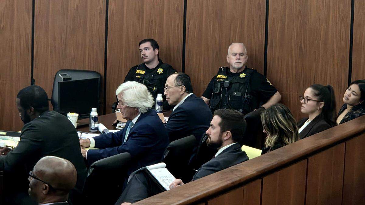 Rick Chow sits to the right of his attorneys Shaun Kent (far left) and Joe McColloch during opening statements, May 27, 2026.