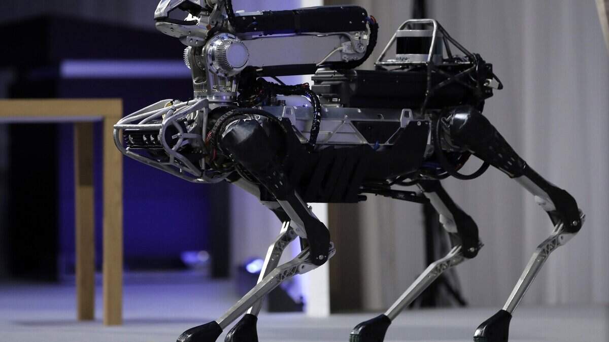 Boston Dynamics’s SpotMini robot is demonstrated at SoftBank World 2017 event in Tokyo, Japan, on July 20, 2017.