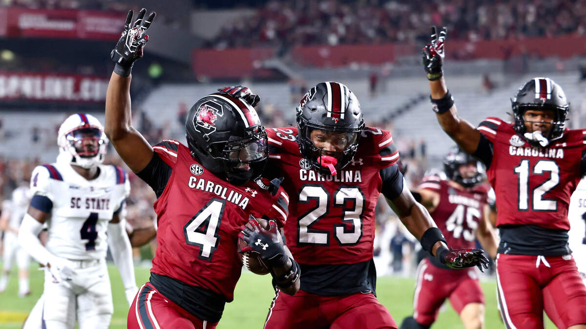 Vicari Swain scores his second punt return for a touchdown in Saturday’s game.
