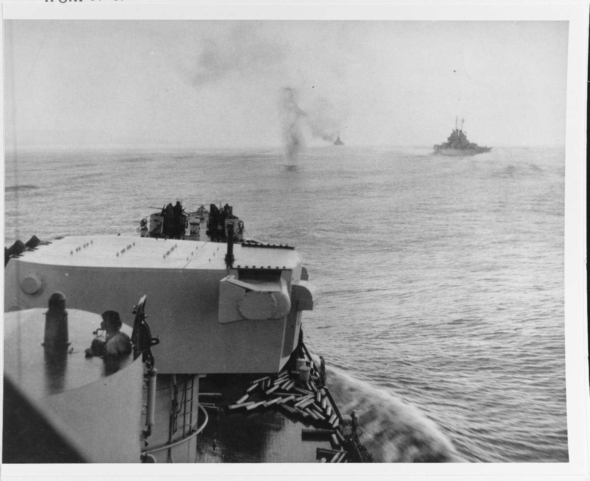 A Japanese plane plunges into the sea ahead of the USS Columbia as the warship steams in column with other cruisers during the attack on Bougainville, Nov. 1-2, 1943.
