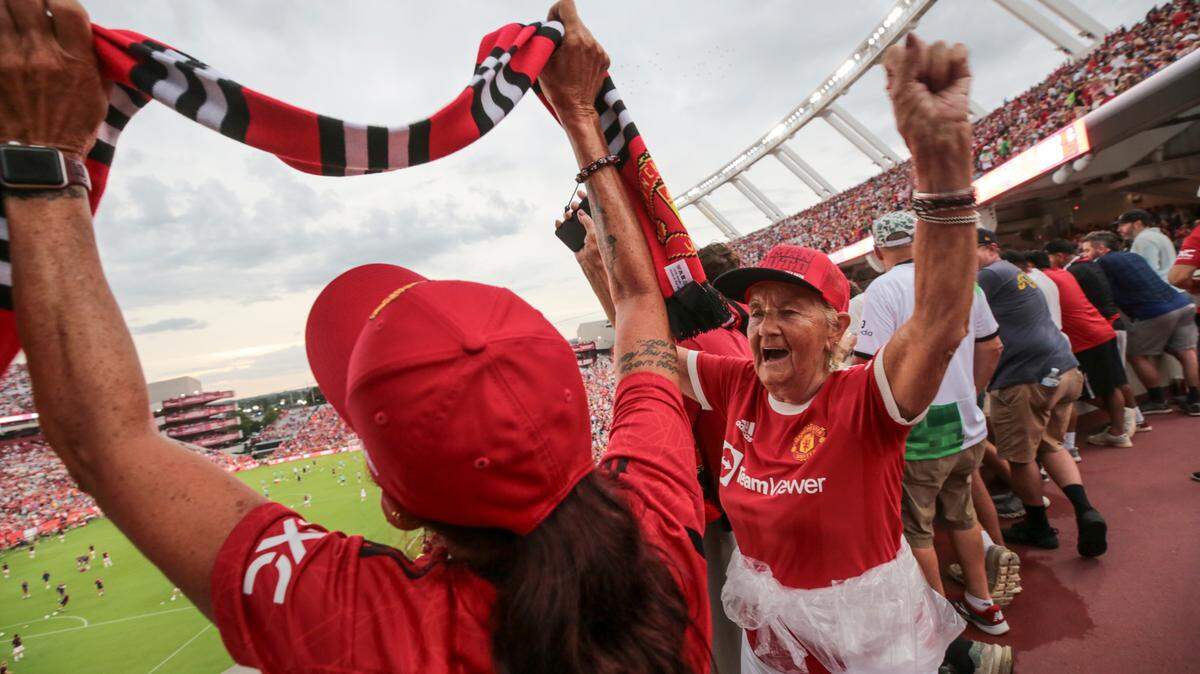 Janet Whittle, right, and her daughter Tracey Lee celebrate Manchester United while the teams are introduced on Saturday, Aug. 3, 2024 Williams-Brice Stadium. Whittle, 81, said attending this game was a bucket-list item for her, having moved to South Carolina from England 35 years ago.