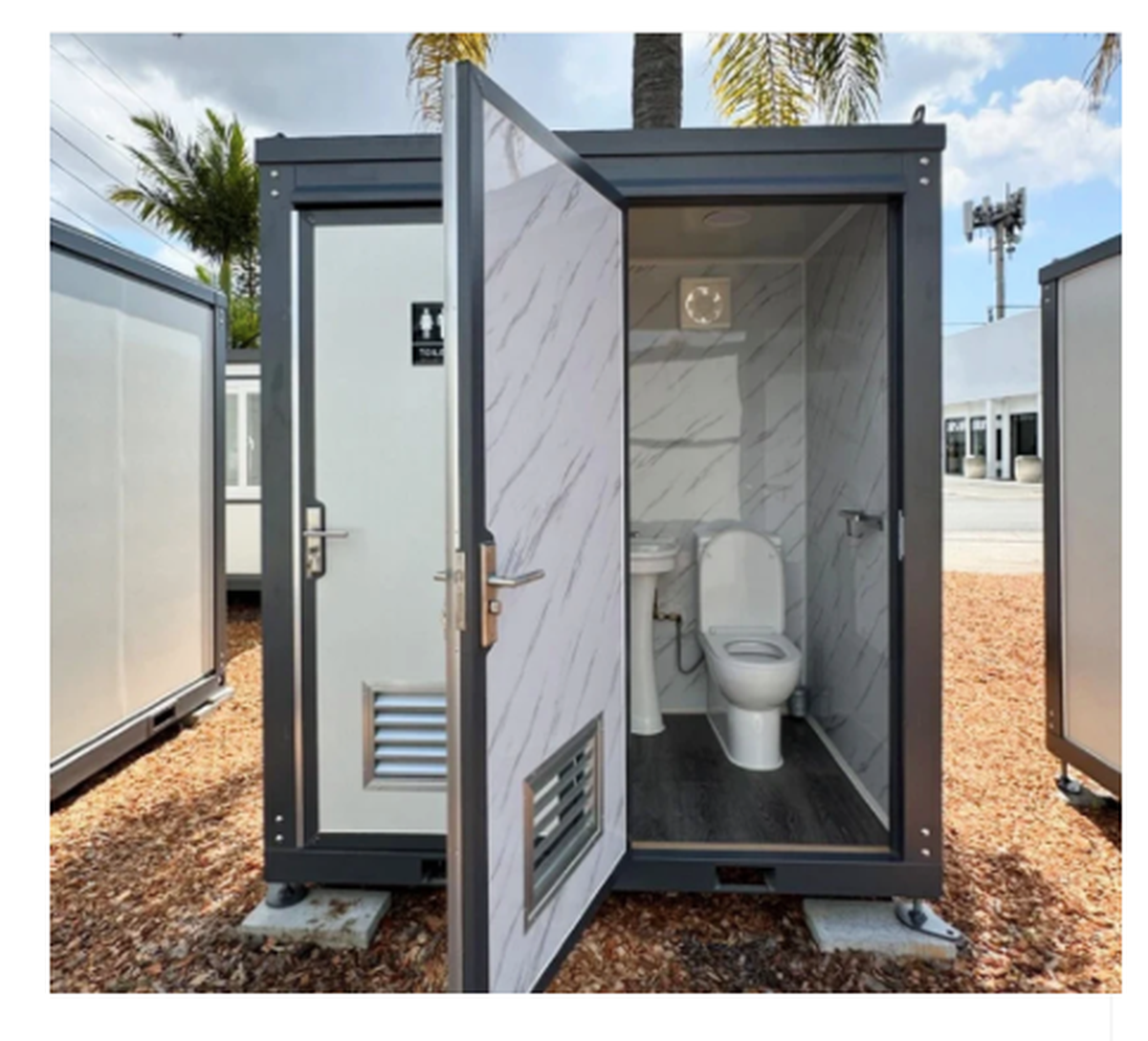 Developer Adam Bergeson has pitched building a bar, dog park and food truck court at a used car lot near North Main Street. Here is an example of what the on-site bathroom could look like.