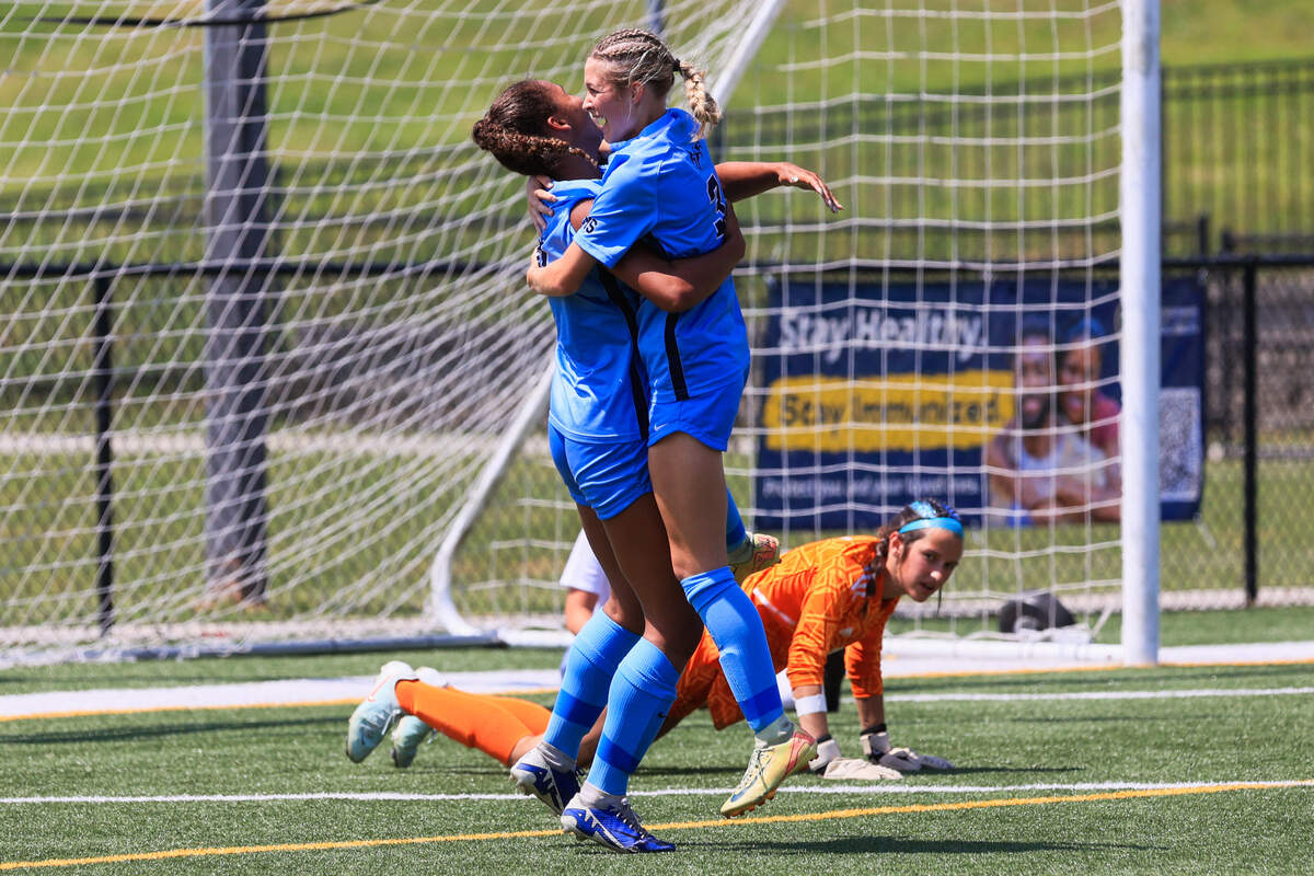 Chapin’s Mayson Donohue (3) and Grace Benson (20) celebrate scoring against Eastside in the 2025 Class 5A Division II State Soccer Championship at Memorial Stadium in Columbia, South Carolina on Saturday, May 24, 2025.