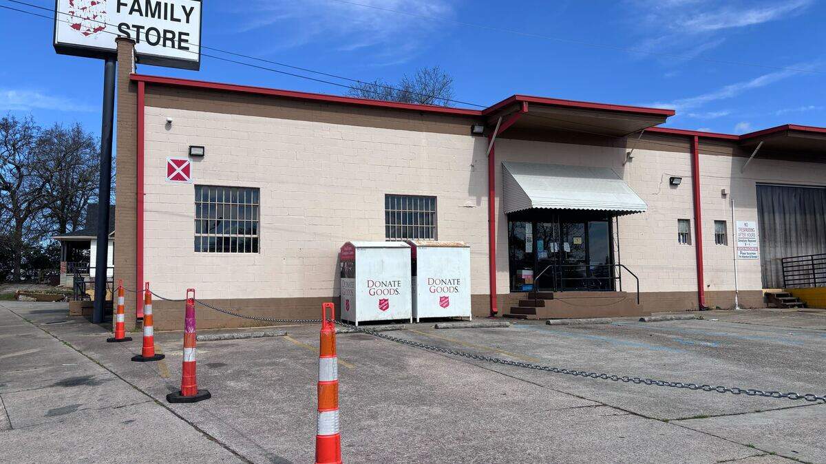 A stack of garbage bags stuffed with fabric is piled inside a window of the currently closed Salvation Army Family Store on Millwood Avenue in Columbia. The thrift store is closed because of damage to the building, and won’t reopen until at least August.