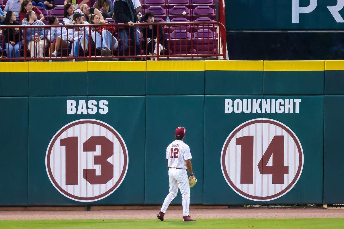 South Carolina Gamecocks LF Ethan Lizama (12) watches an Arkansas home run leave the park during the game between Arkansas and South Carolina at Founders Park, 3/20/26.