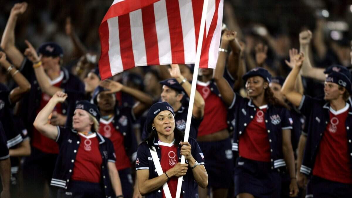 U.S. basketball player Dawn Staley leads the American team in the Olympic Stadium during the opening ceremonies for the 2004 Olympic Games on Friday, August 13, 2004, in Athens, Greece.