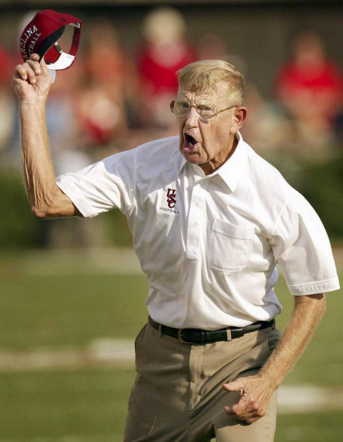 USC coach Lou Holtz gets emotional during a game. 