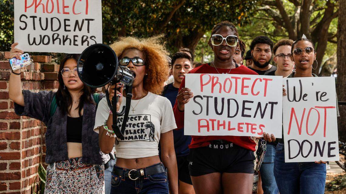 Courtney McLain leads University of South Carolina students in marching from the school to the front of the statehouse. Students were raising awareness about student safety, race relations, student wages and the mishandling of student athlete injuries on Wednesday, April 05, 2023.