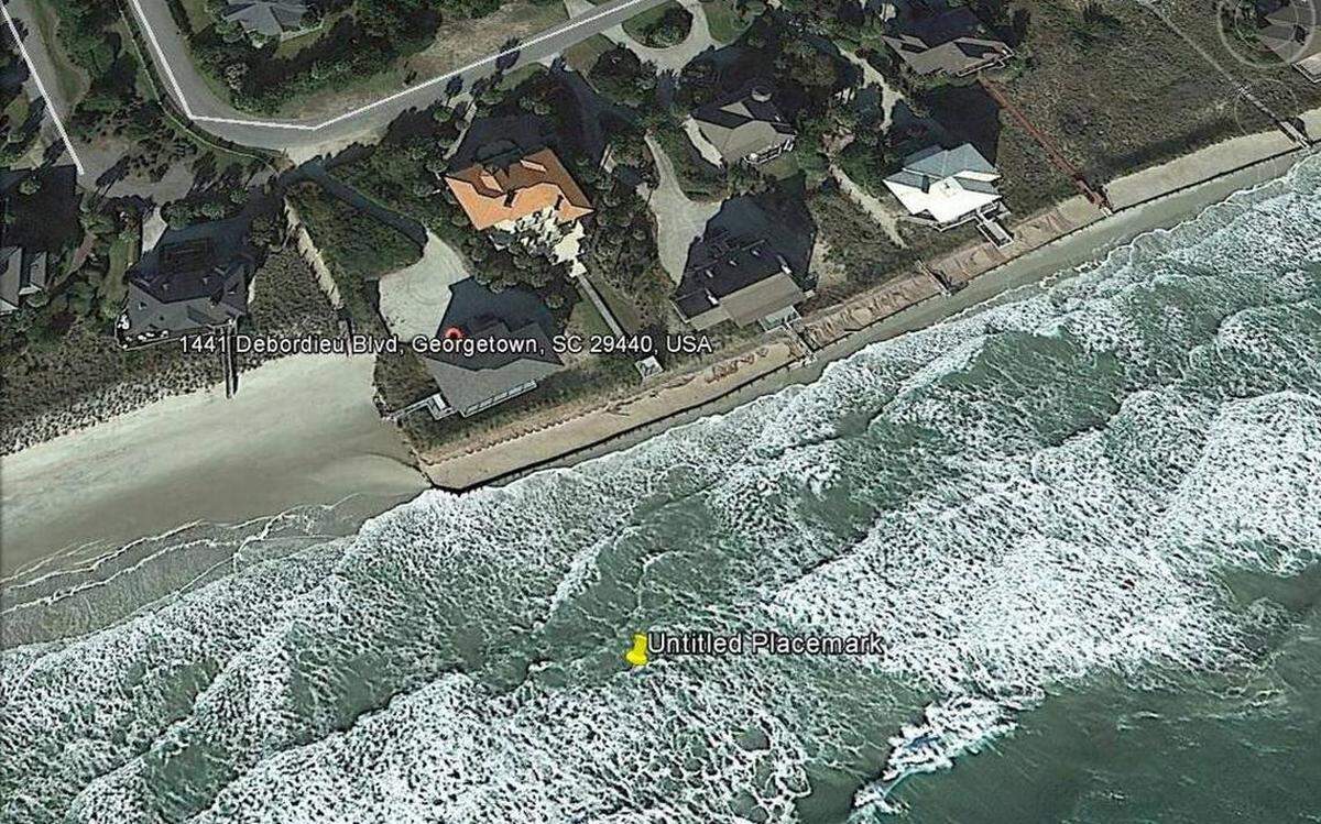 This seawall in Debordieu Beach juts into the ocean, blocking the public beach. The southern tip of Debordieu is one of the most erosion-scarred stretches of the South Carolina coast.