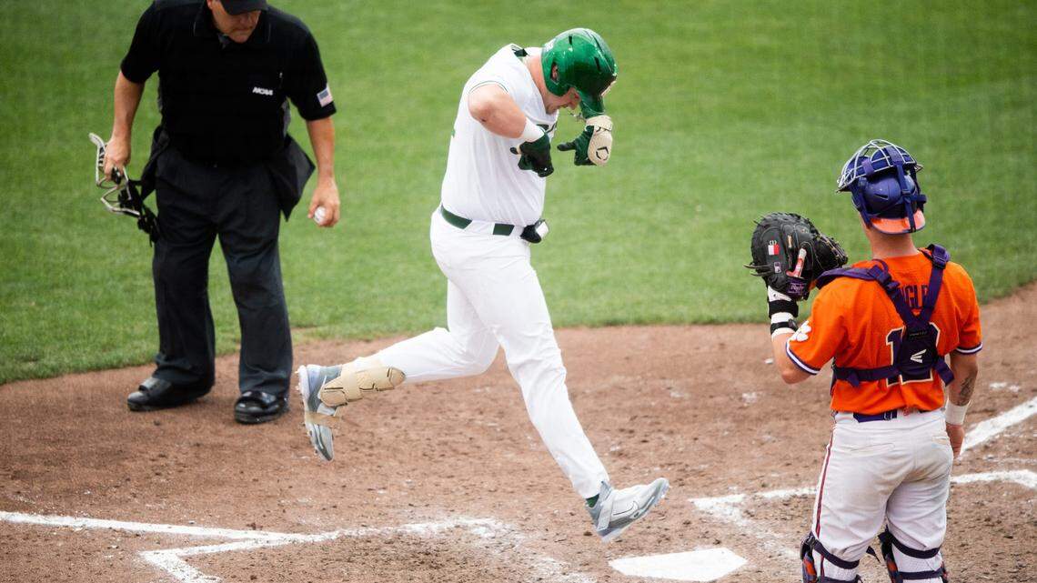 Charlotte’s Will Butcher (22) crosses home plate after hitting a game-tying home run during a NCAA baseball regional game between Clemson and Charlotte held at Doug Kingsmore Stadium in Clemson, S.C., on Sunday, June 4, 2023.