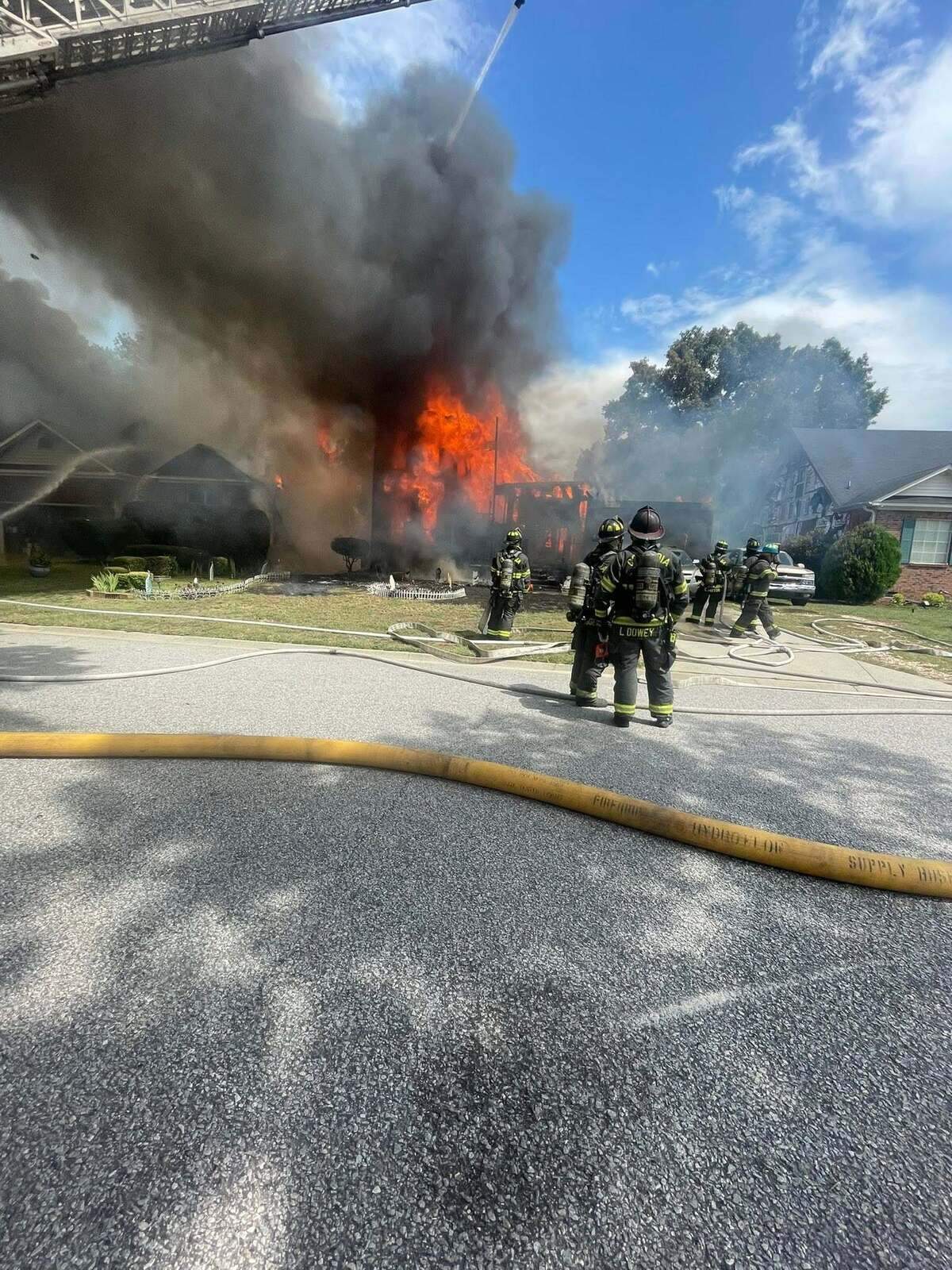 Members of the Columbia Fire Department respond to burning buildings.