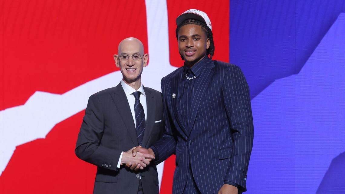 Jun 25, 2025; Brooklyn, NY, USA; Collin Murray-Boyles stands with NBA commissioner Adam Silver after being selected as the ninth pick by the Toronto Raptors in the first round of the 2025 NBA Draft at Barclays Center. Mandatory Credit: Brad Penner-Imagn Images