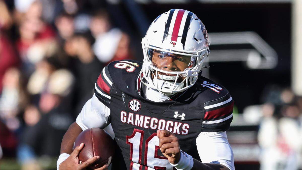South Carolina quarterback Lanorris Sellers (16) carries the ball during the second half of South Carolina’s game against Clemson at Williams-Brice Stadium in Columbia on Saturday, November 29, 2025.