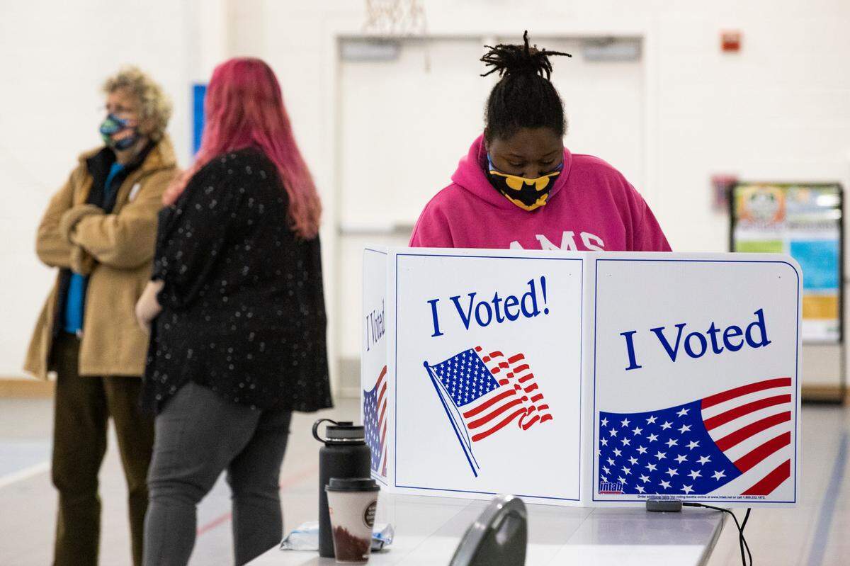 Lilliann Hemingway votes in a presidential election for the first time at the Trenholm Park voting location in Columbia, South Carolina on Tuesday, November 3, 2020. She says it was very important to her grandmother that she voted this year, due to the sacrifices of generations past to secure her right to vote.