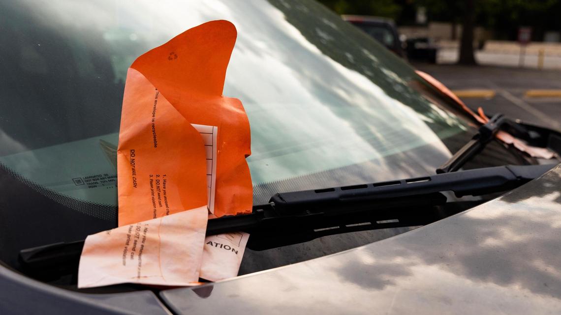 Parking tickets pile up on a parked car near the South Carolina Statehouse on Tuesday, May 23, 2023.