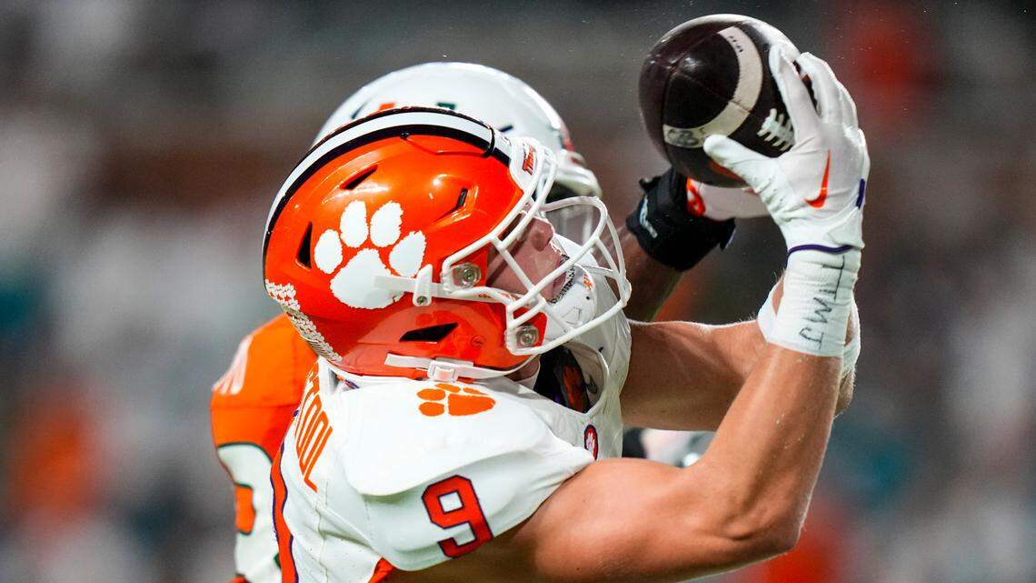 Oct 21, 2023; Miami Gardens, Florida, USA; Clemson Tigers tight end Jake Briningstool (9) makes a catch to score a touch down against the Miami Hurricanes during the second quarter at Hard Rock Stadium. Mandatory Credit: Rich Storry-USA TODAY Sports
