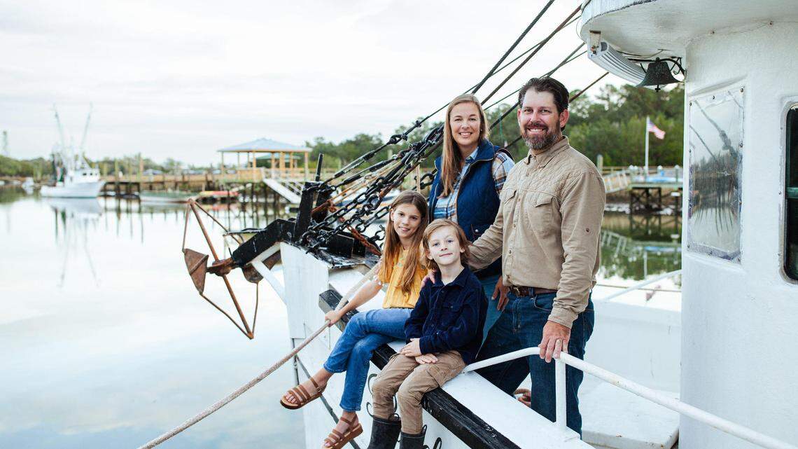 Bryan Jones, his wife Dana Baker and their kids, Ella Grace and Easton, are shown aboard the Pamela Sue.