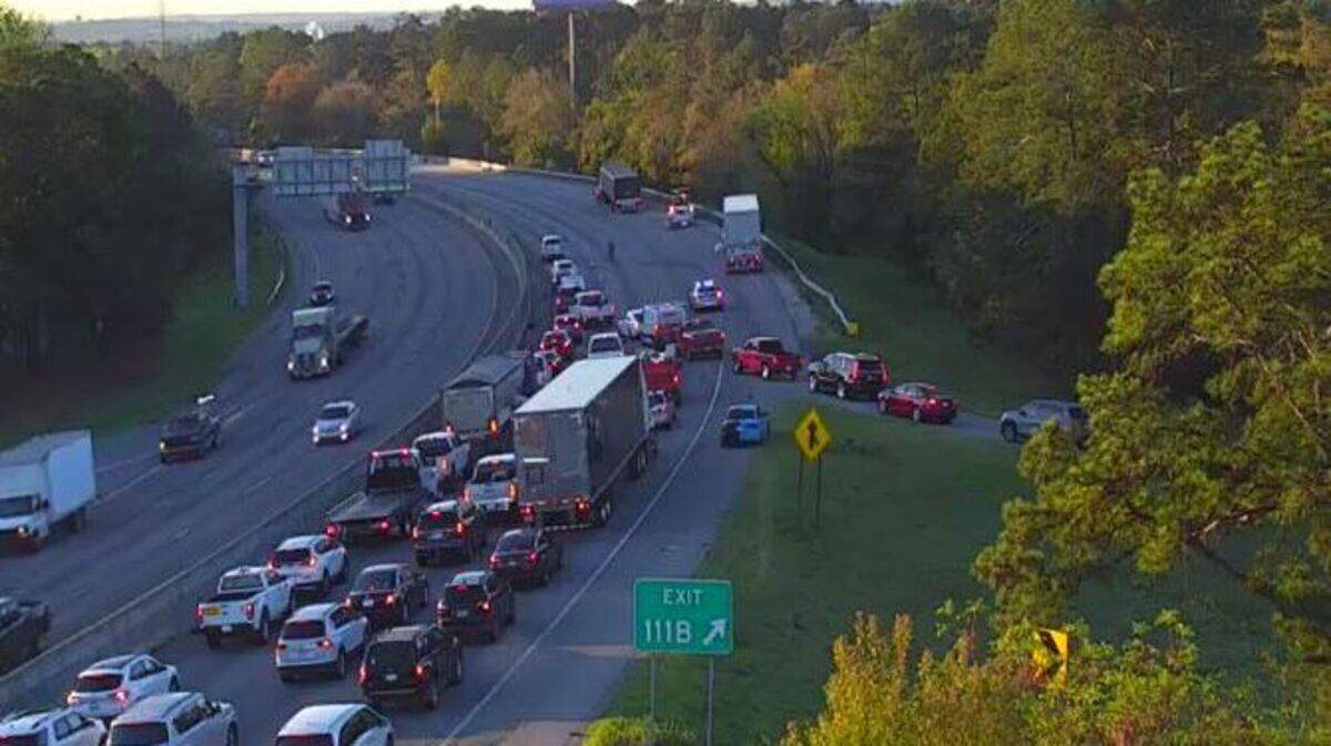 Vehicles are backed up following a crash.