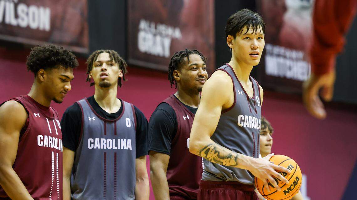 South Carolina guard Mike Sharavjamts (55) to head coach Lamont Paris during the Gamecocks’ practice at the Carolina Coliseum in Columbia on Thursday, October 2, 2025.