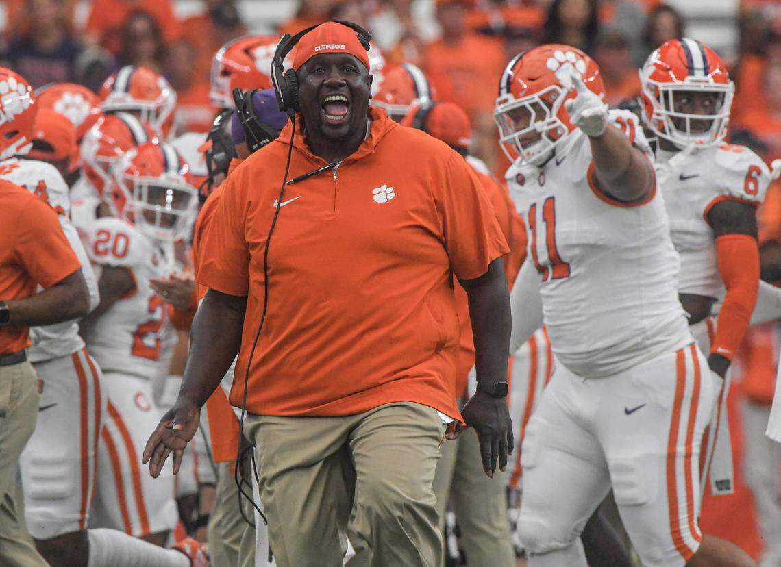 Sep 30, 2023; Syracuse, New York, USA; Clemson Tigers defensive tackles coach Nick Eason reacts after defensive tackle Payton Page (55) recovered a Syracuse Orange fumble during the first quarter at JMA Wireless Dome.