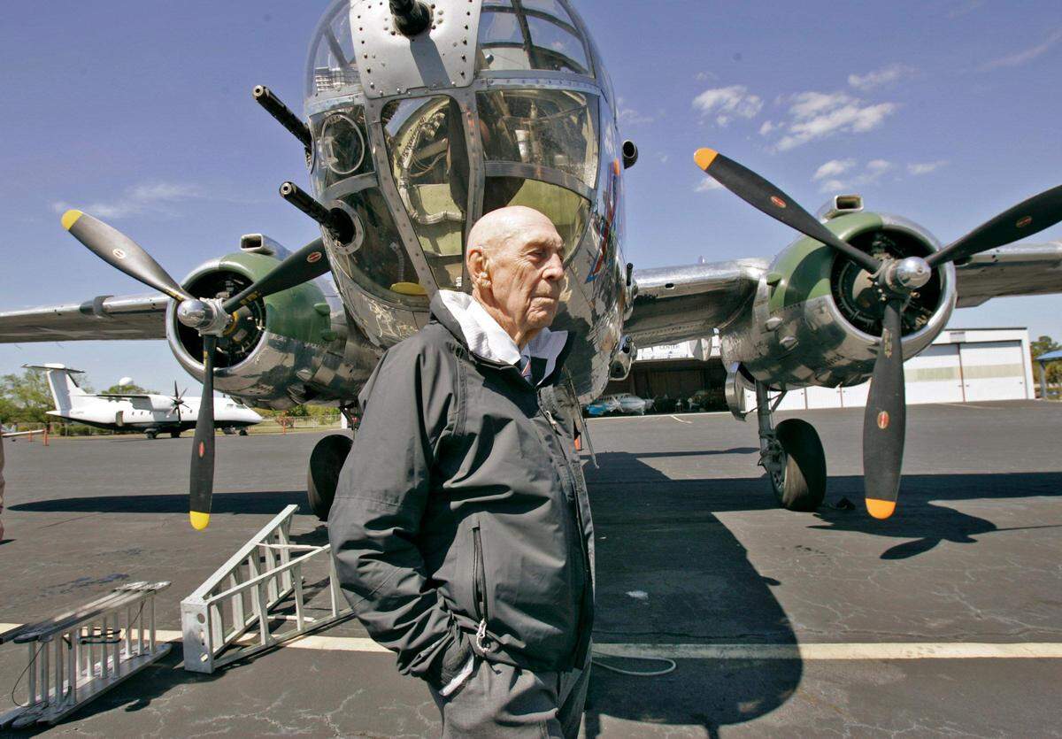 Doolittle Raider Dick Cole walks around a vintage WW II B-25 bomber at Columbia Metropolitan Airport before taking a flight on Thurs. Apr. 16, 2009. Cole was co-pilot in Col. Doolittle’s aircraft during the famous air bombing mission. The 80 Doolittle Raiders formed as a group in Columbia, while training at what is now the Columbia Metropolitan Airport. They meet each year to remember their 1942 Raid Over Tokyo.