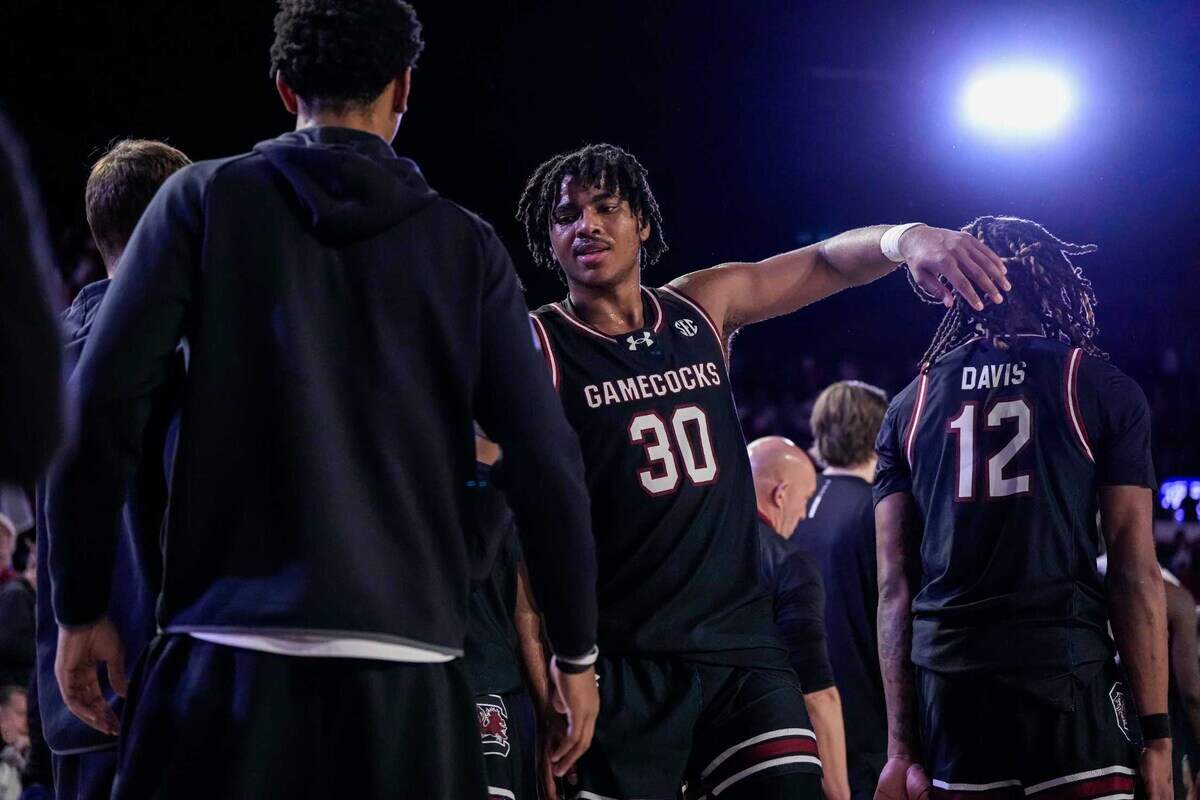 South Carolina Gamecocks forward Collin Murray-Boyles (30) reacts with teammates after defeating the Georgia Bulldogs at Stegeman Coliseum.