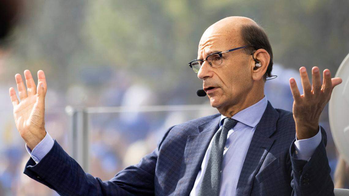 SEC Nation host Paul Finebaum talks to his co-hosts during the SEC Nation broadcast in Lexington, Ky., Saturday, Oct. 9, 2021. (AP Photo/Michael Clubb)