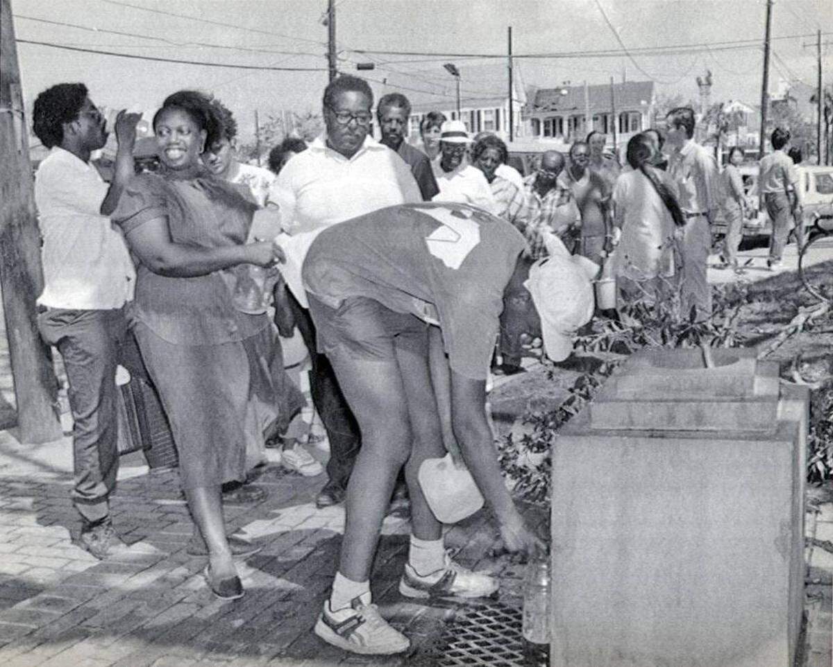 South Carolinians line up to fill water jugs on September 22, 1989 after Hurricane Hugo cut power, water and other utilities across the state.