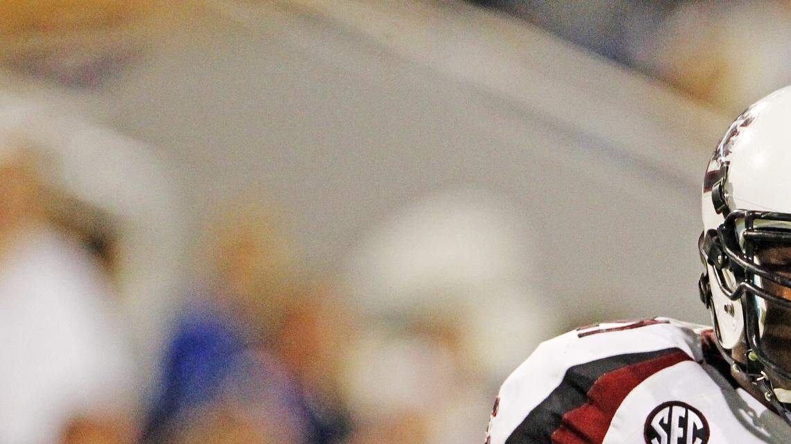 South Carolina Gamecocks running back Marcus Lattimore (21) celebrates a third quarter touchdown by teammate Kenny Miles (31) in the third quarter of the Gamecocks game against the Wildcats at Commonwealth Stadium.