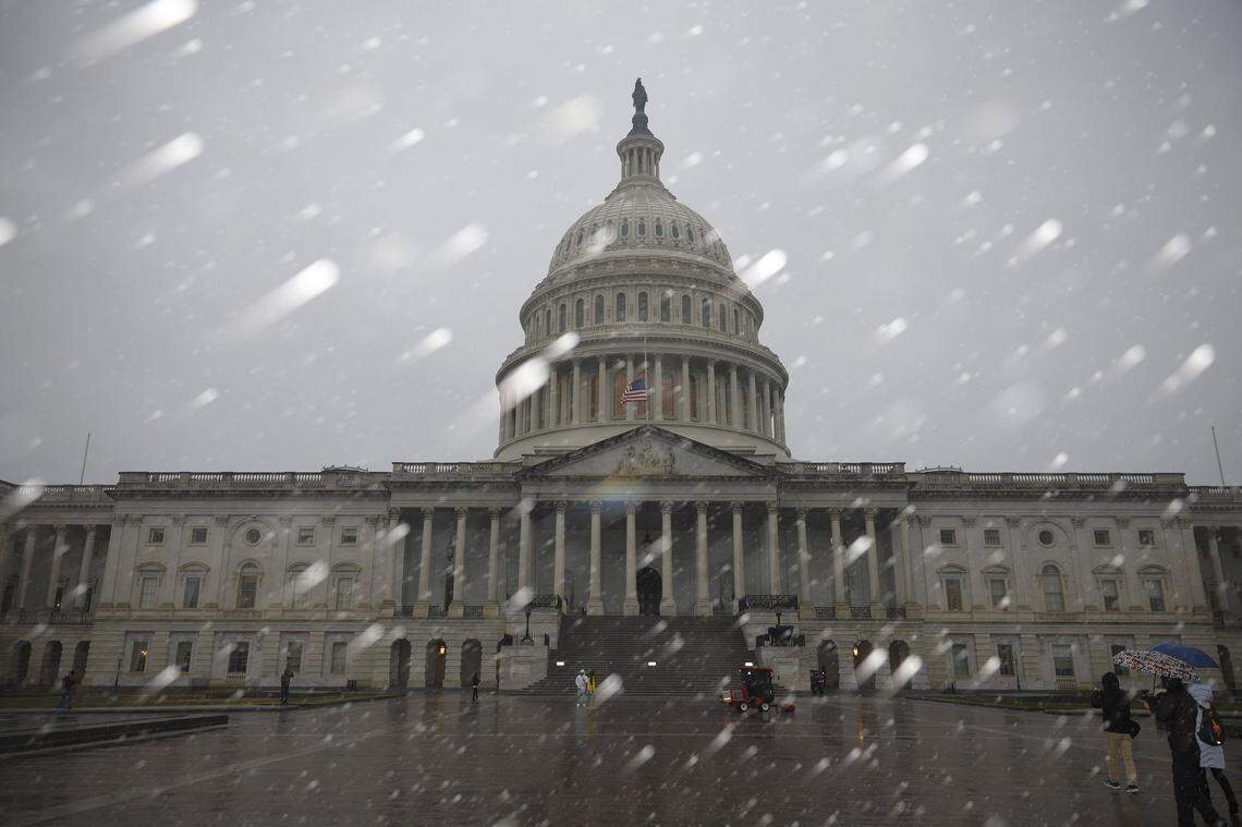 Snow falls over the U.S. Capitol Building on Jan. 19, 2025, in Washington, D.C. U.S. President-elect Donald Trump and Vice President-elect JD Vance will be sworn in on January 20. The inauguration ceremony was will be held inside due to cold weather. (Kevin Dietsch/Getty Images/TNS)