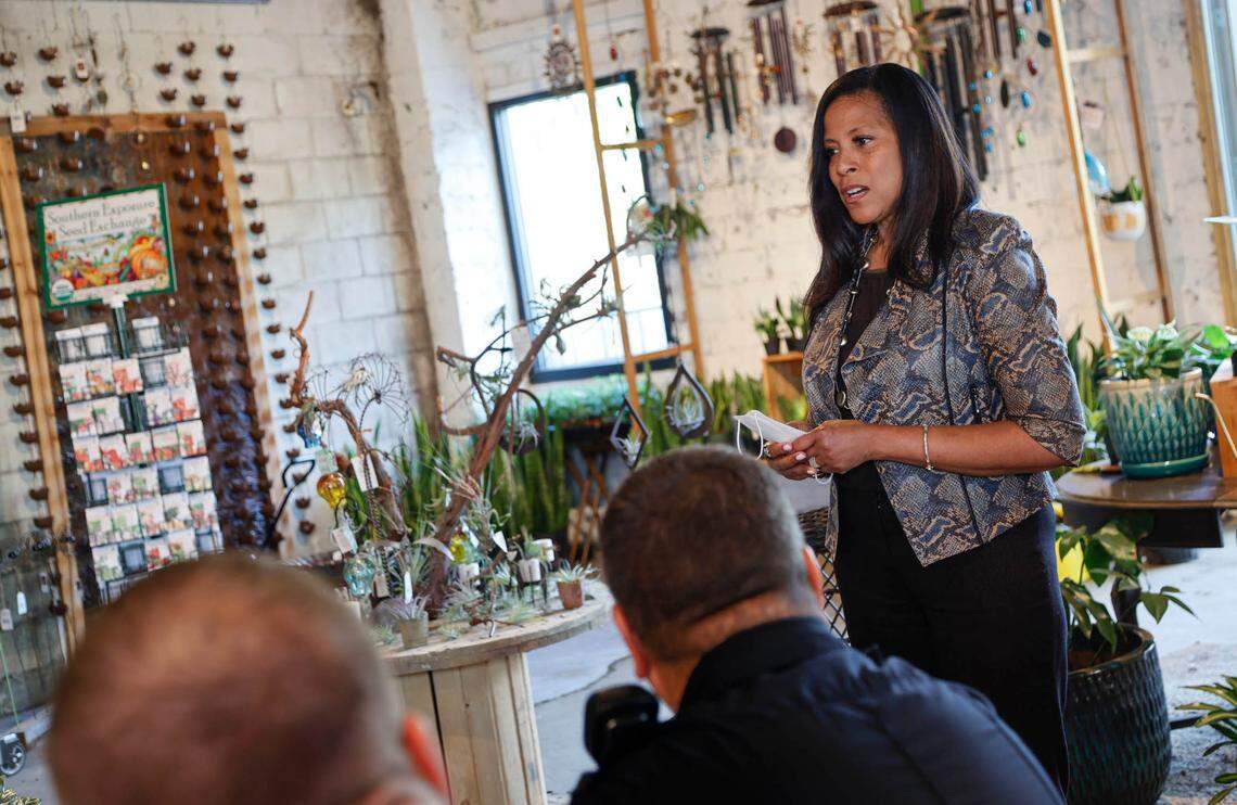 Mia McLeod talks to a group gathered at Gardener’s Outpost in Columbia for a meeting of the North Main Business Association on Thursday, May, 19, 2022 McLeod is a Democratic candidate for governor.