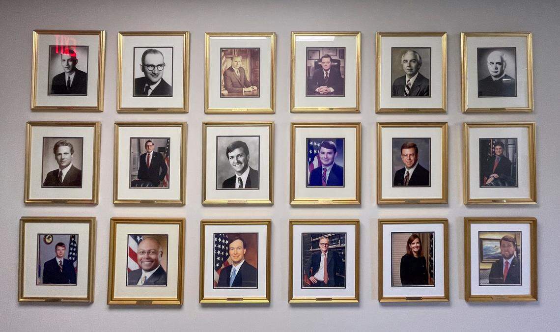 Portraits of United States Attorneys of the District of South Carolina line the hallway at the Columbia field office.
