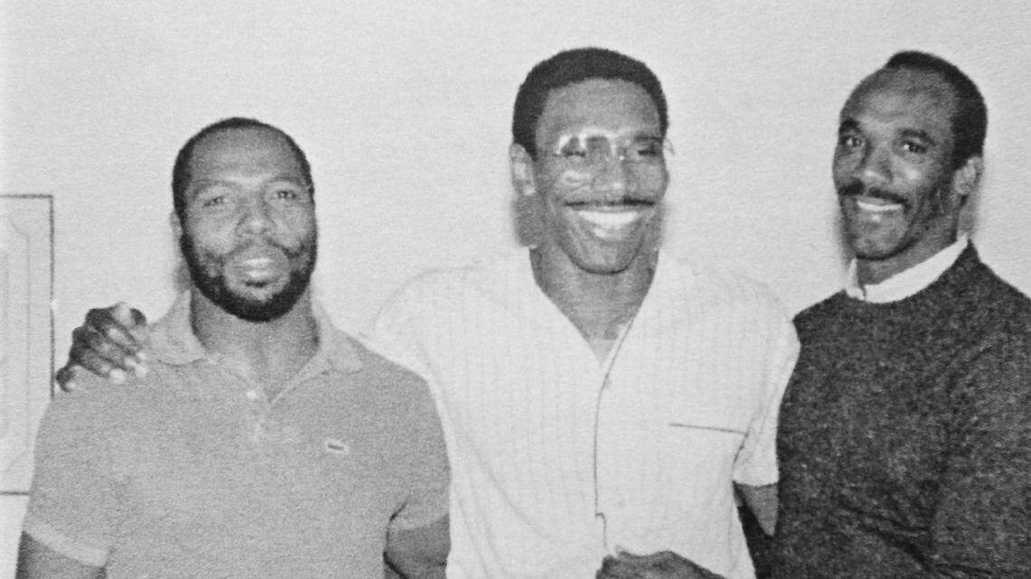 Sam Goodwin with Pittsburgh Steelers all stars Donnie Shell, left, and John Stallworth, right.
