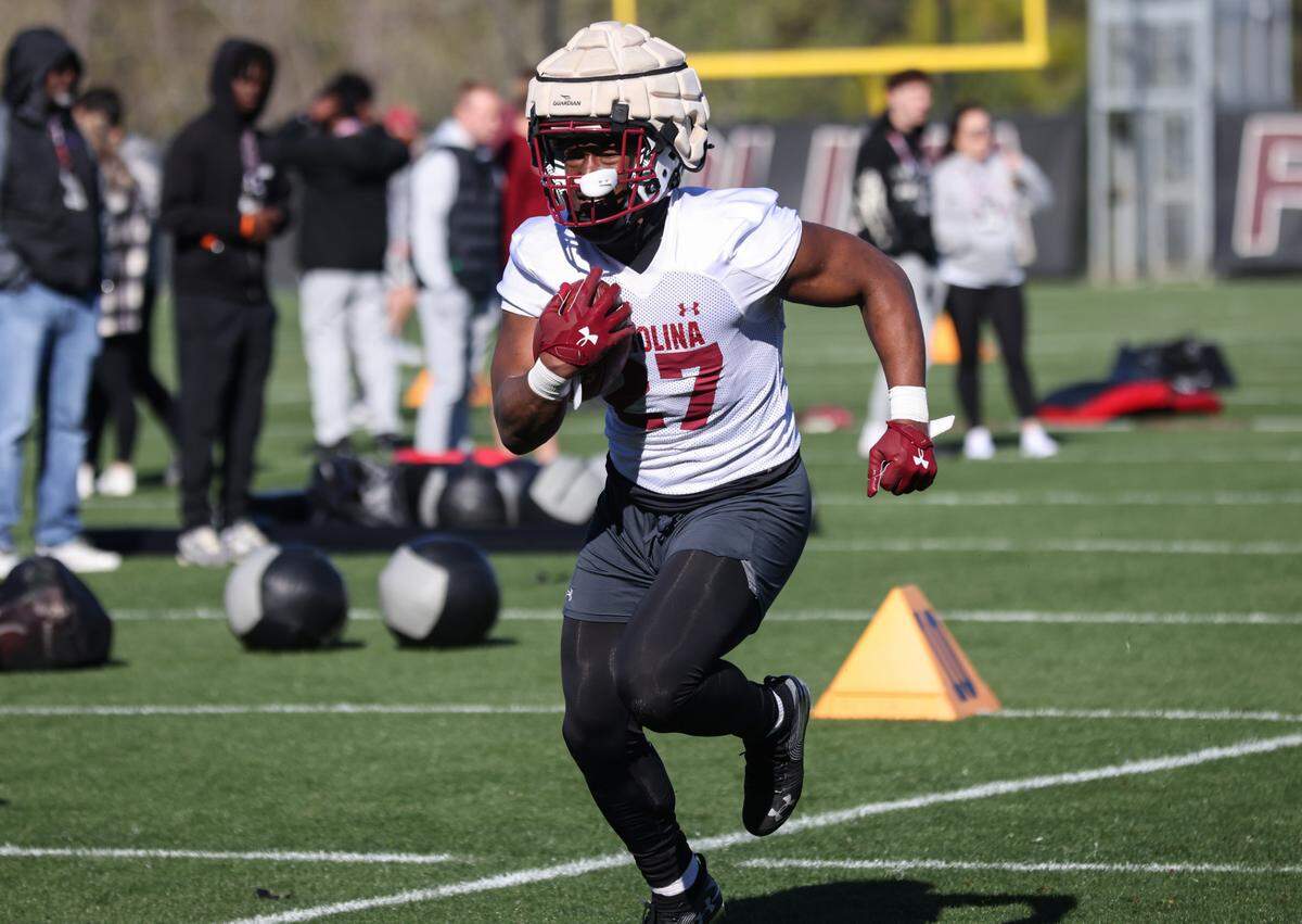 South Carolina running back Oscar Adaway III (27) runs drills during the Gamecocks’ practice in Columbia on Tuesday, March 19, 2024.