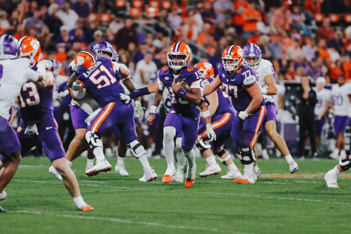 Clemson quarterback Chris Denson (15) carries the ball against Furman during a Saturday, Nov. 22, 2025 game at Memorial Stadium.