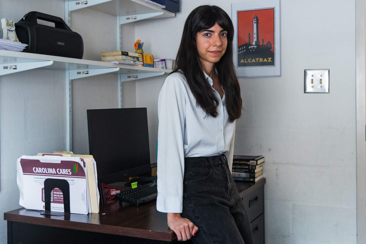 Christina Plakas, a criminology and criminal justice doctoral student at the University of South Carolina, stands in her office.