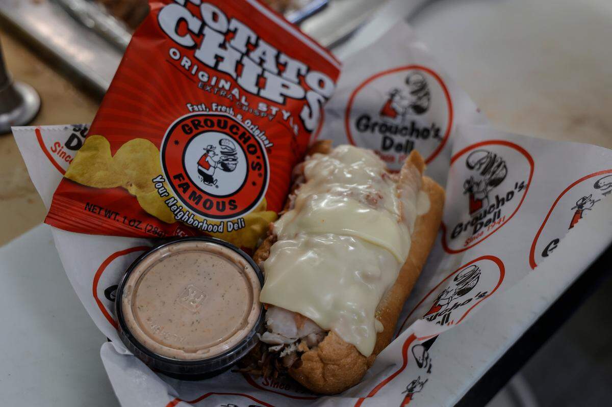 The popular STP Dipper from Groucho’s Deli features turkey, roast beef, Swiss cheese and bacon bits. It is a top selling sandwich at Groucho’s.