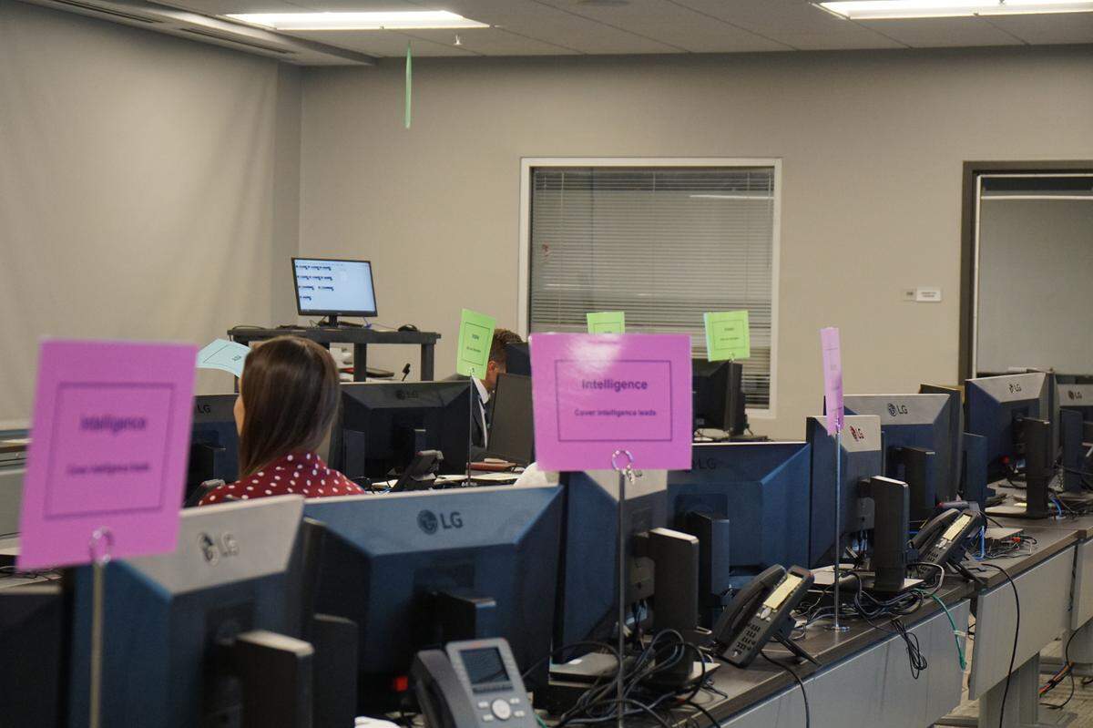 On Nov. 4, 2024, the day before election day, agents and analysts inside of the FBI’s election crime command post in South Carolina prepare to respond to reports of election-related incidents.