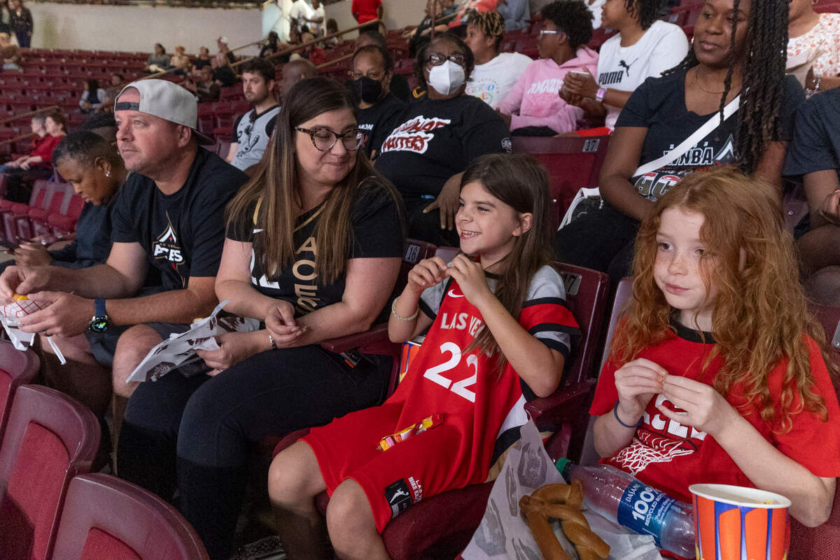 Jimmy and Susan Yttri and their daughter, Brooklyn Yttri, 9, and her friend Teagan Andress, 7, of Fort Mill watch for A’ja Wilson in the Colonial Life Arena. The Yttri’s have traveled to Las Vegas to watch the Aces play.
