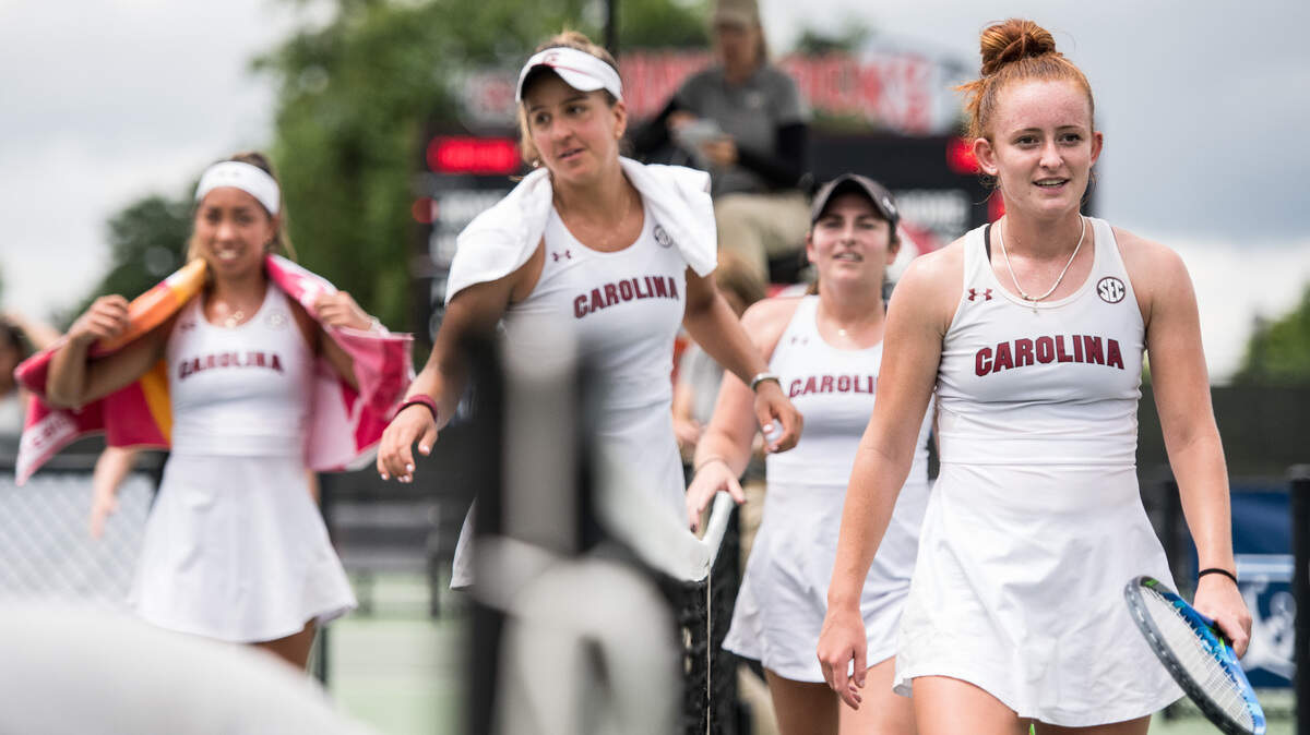 South Carolina’s Megan Davies, right, Ingrid Martins, second from left, Mia Horvit, left and Rachel Rohrabacher change courts after doubles wins against North Florida during the NCAA tournament Friday, May 3, 2019, in Columbia, S.C.
