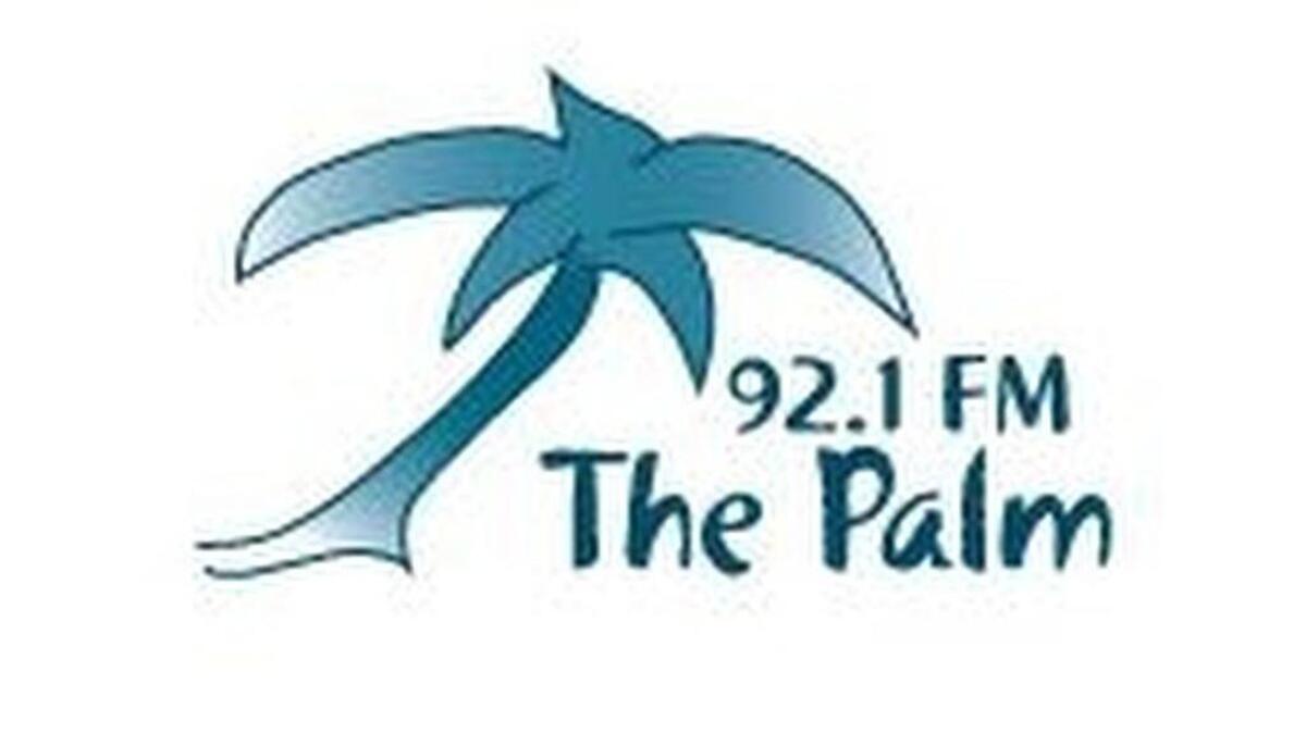 92.1 The Palm logo.