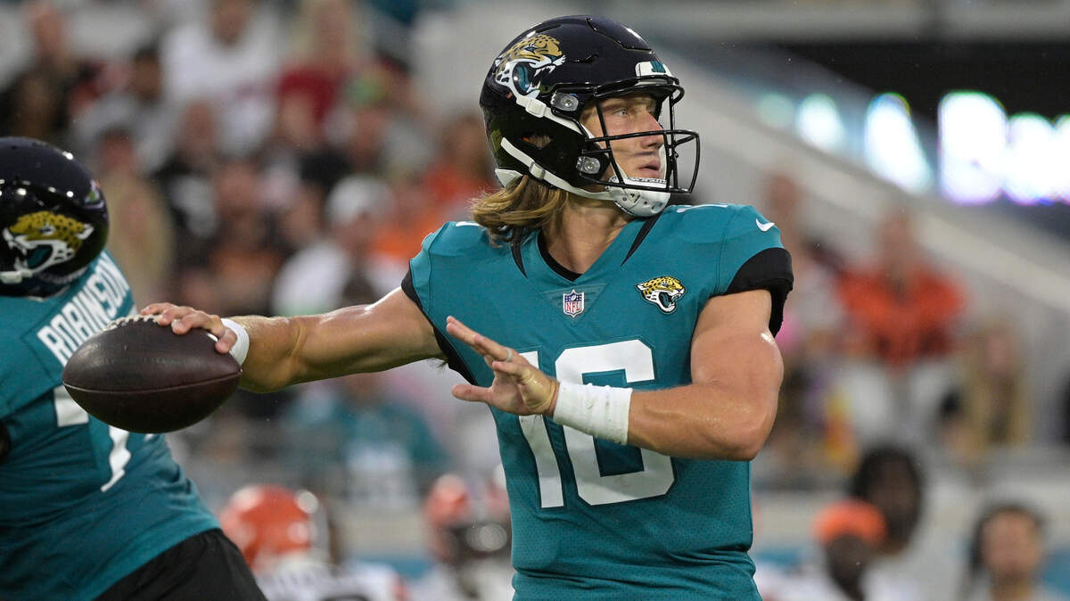 Jacksonville Jaguars quarterback Trevor Lawrence looks for a receiver against the Cleveland Browns during the first half of an NFL preseason football game, Saturday, Aug. 14, 2021, in Jacksonville, Fla. (AP Photo/Phelan M. Ebenhack)