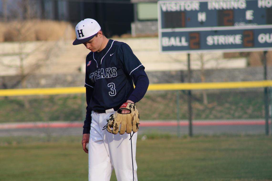 Clemson student Toby Corriston pitching at Harrisonburg (Va.) High School